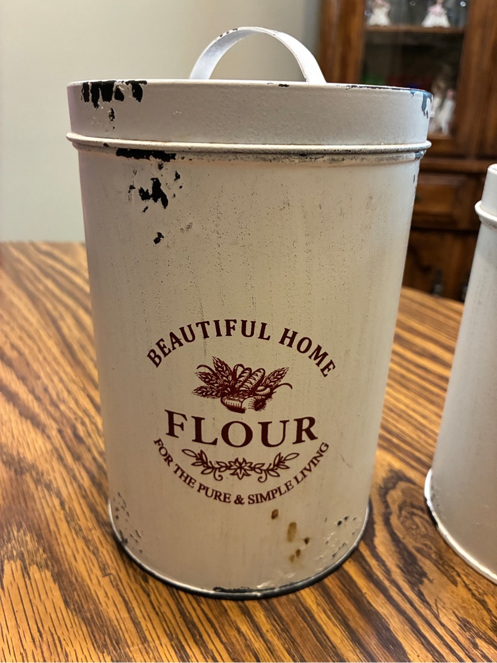white metal canister set features a distressed farmhouse design "Beautiful Home - Picture 2 of 7